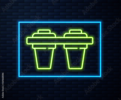 Glowing neon line Water filter icon isolated on brick wall background. System for filtration of water. Reverse osmosis system. Vector Illustration.