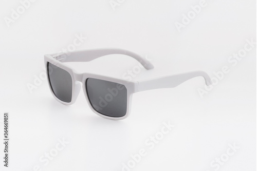 white sun glasses isolated on white/gray background