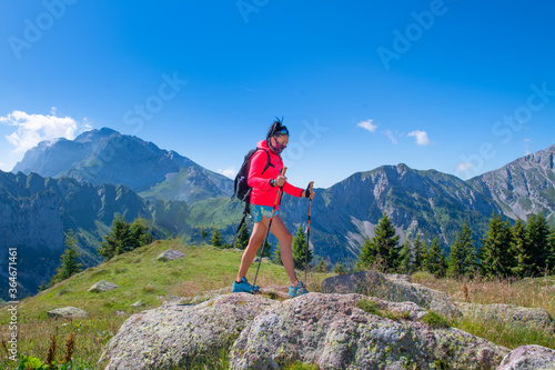 A woman walks in the mountains with anti virus mask © michelangeloop