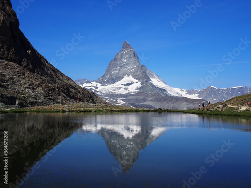 Matterhorn seen from the mountain climbed by the train in Zermatt on a sunny day. © ponkichi9