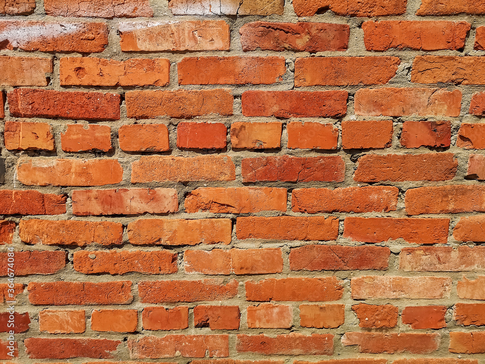 THE RED Weathered stained old brick wall. THE RED Weathered stained old brick wall.