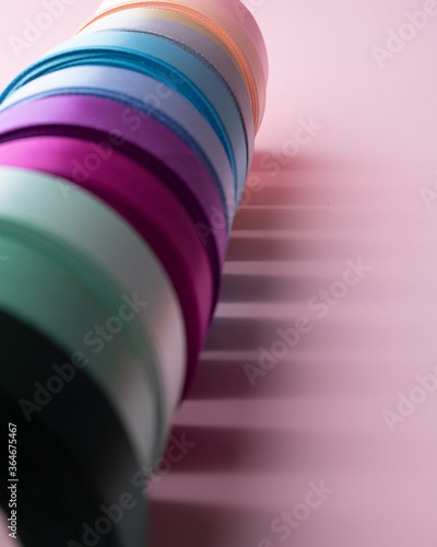 colored packing tape in rolls on colored background