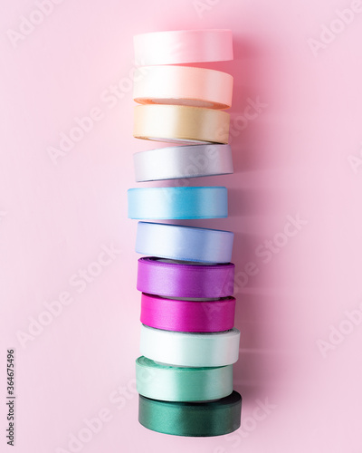 colored packing tape in rolls on colored background