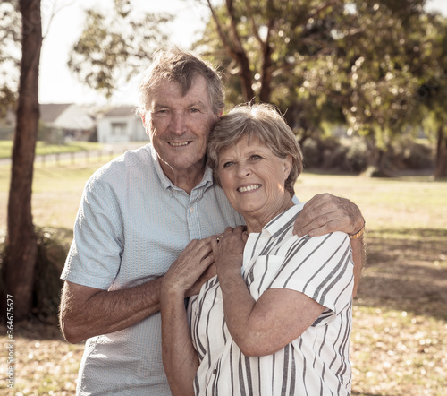 Portrait of elderly senior couple enjoying retirement lifestyle feeling happy aging together © SB Arts Media