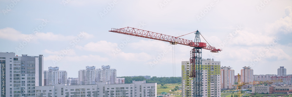 big crane on construction site residential buildings background panoramic view big crane on construction site residential buildings background panoramic view