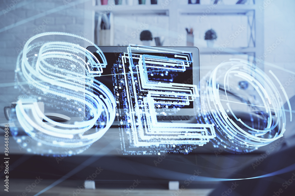 Multi exposure of table with computer and seo drawing hologram. Search optimization concept. Multi exposure of table with computer and seo drawing hologram. Search optimization concept.
