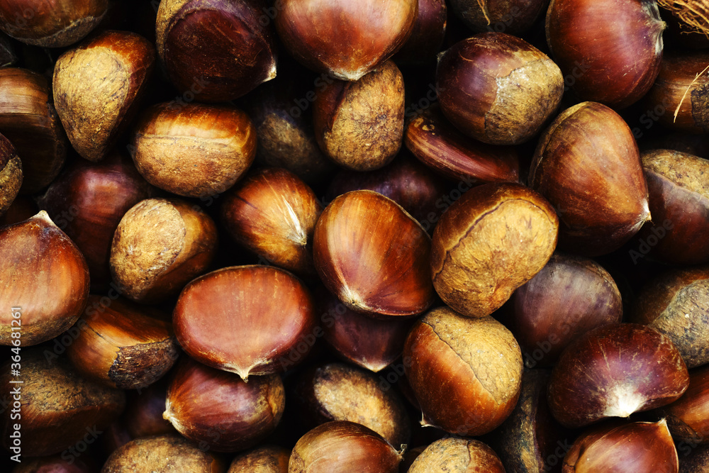 Chestnut fruits on the counter in the store. Close-up. View from above Chestnut fruits on the counter in the store. Close-up. View from above