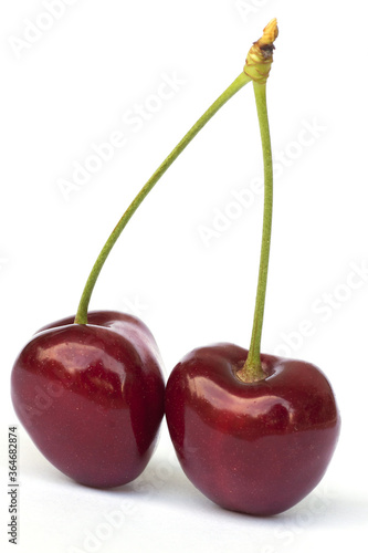 couple of cherries isolated on white background