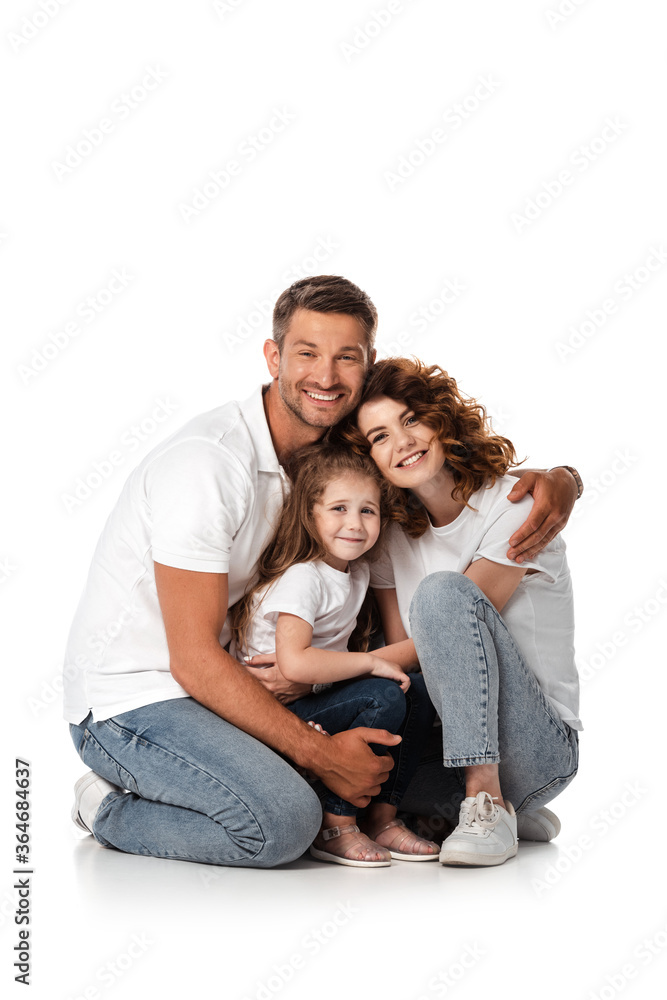 happy man hugging wife and daughter on white happy man hugging wife and daughter on white