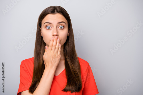 Close-up portrait of her she nice attractive lovely shocked confused straight-haired girl closing mouth oops fail failure isolated over light gray pastel color background