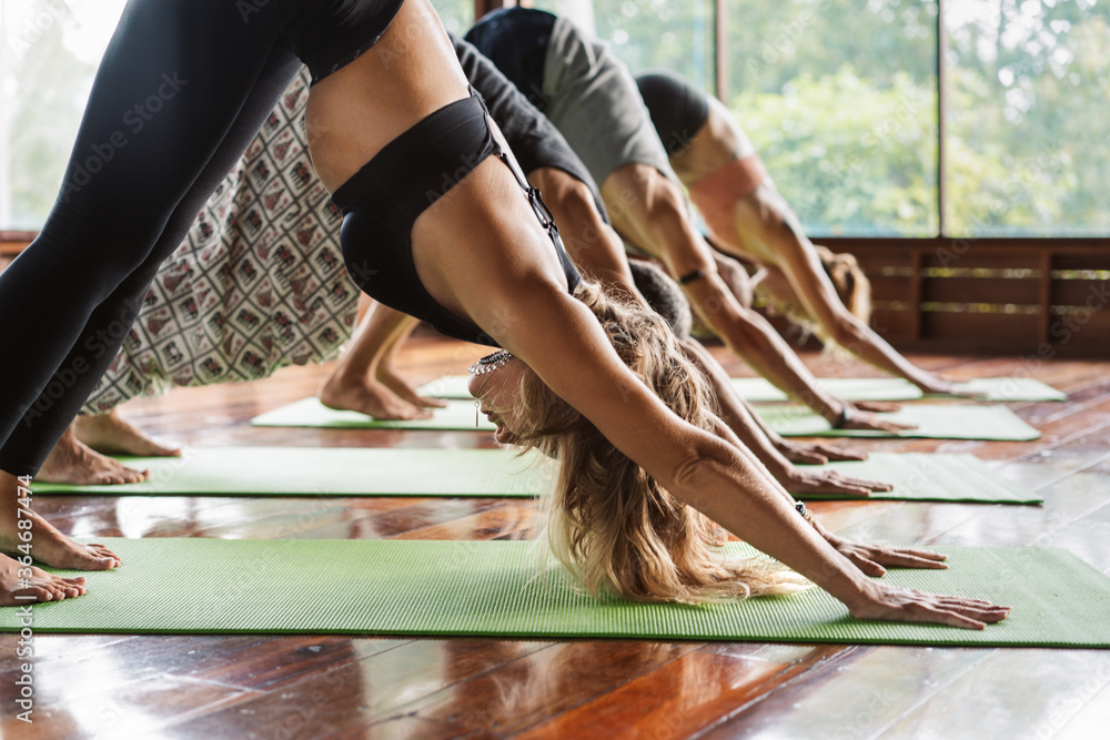 People doing yoga together at the morning