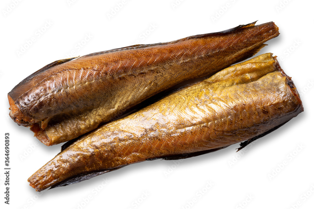 Two hot smoked pollock fish isolated on white background. Top view. Two hot smoked pollock fish isolated on white background. Top view.
