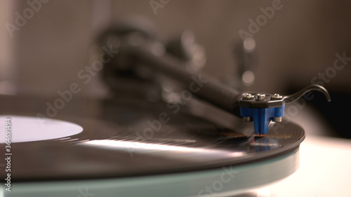 Vinyl player is a retro thing for playing music. Old vinyl record sounds good.