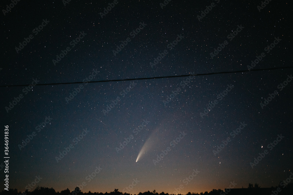 Comet C / 2020 F3 NEOWISE Observation. Comet in the starry sky.