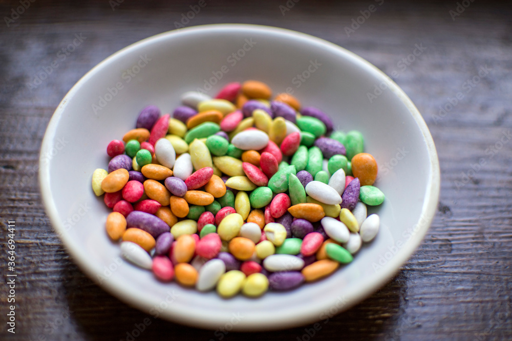 multi-colored candies in a plate close-up multi-colored candies in a plate close-up