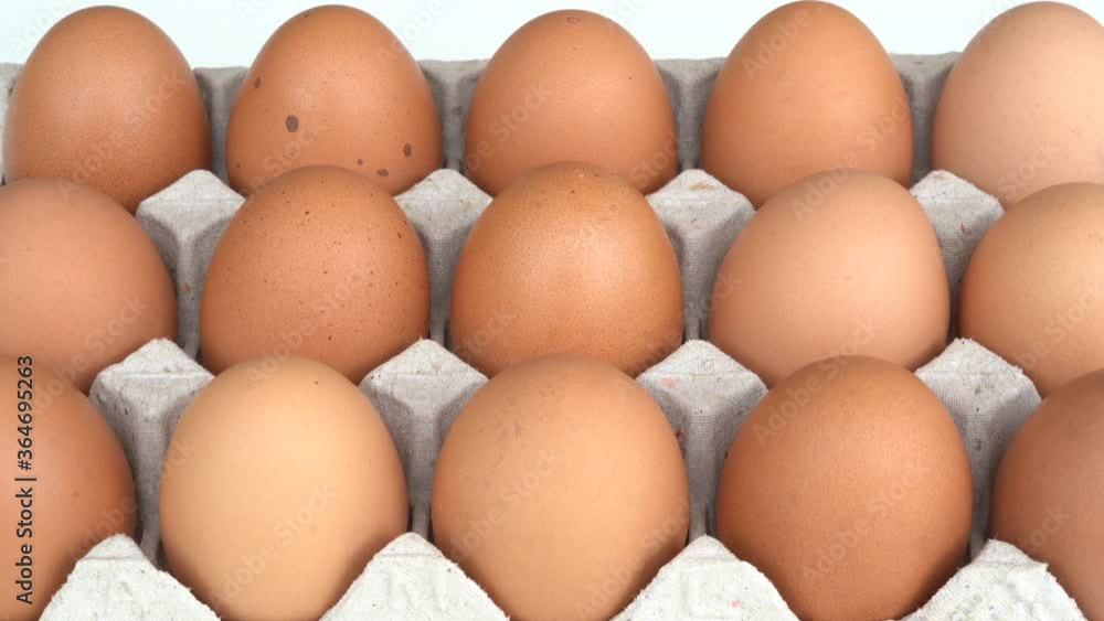 eggs in a cardboard box for preparing food in a kitchen eggs in a cardboard box for preparing food in a kitchen