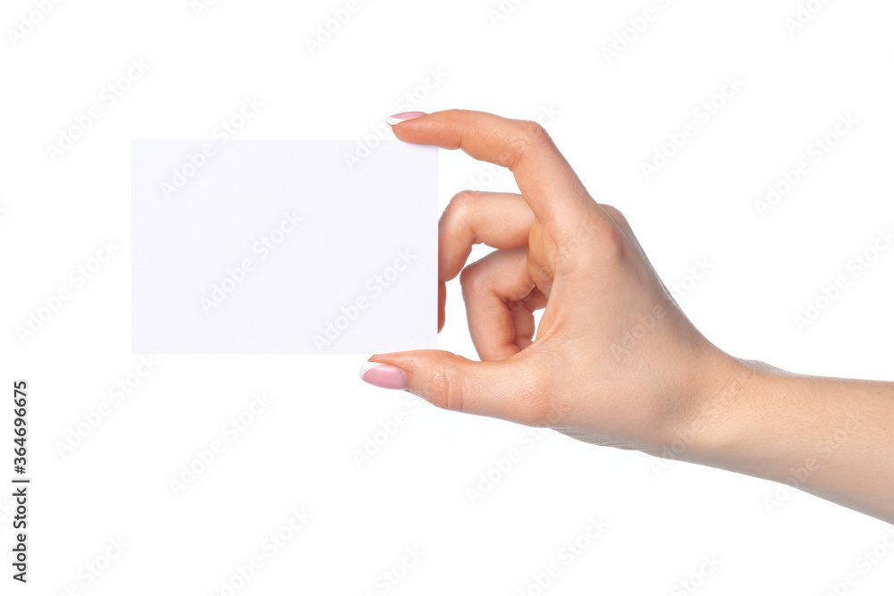 Woman's hand with blank white business card isolated on white Woman's hand with blank white business card isolated on white