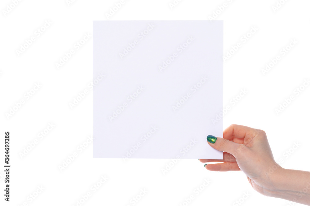 Woman's hand showing white paper banner isolated on white Woman's hand showing white paper banner isolated on white