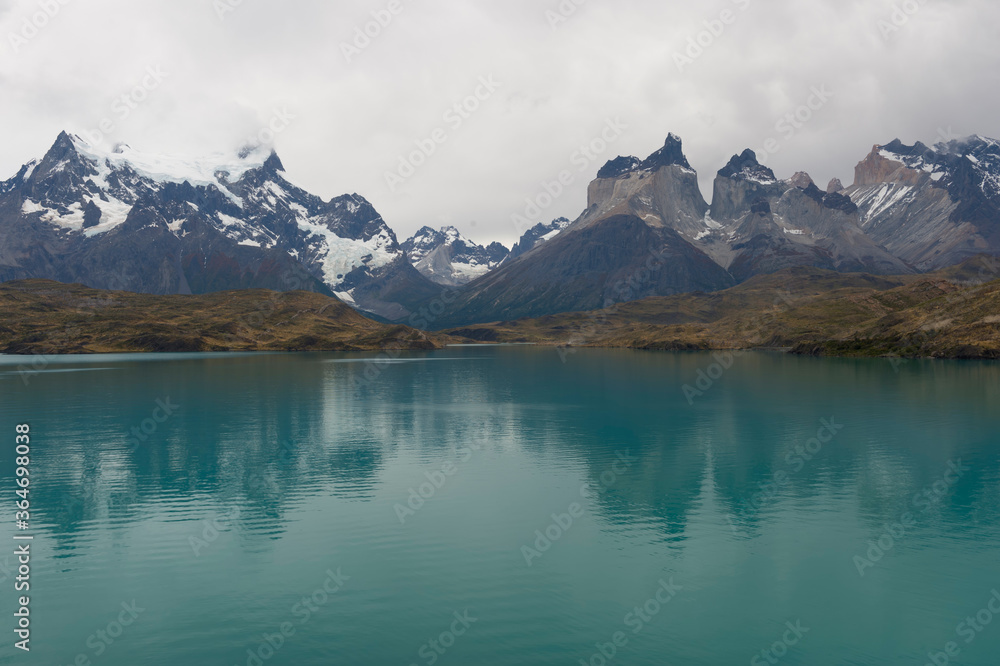 Cuernos del Paine reflecting in Lago Pehoe, Torres del Paine National Park, Chilean Patagonia, Chile