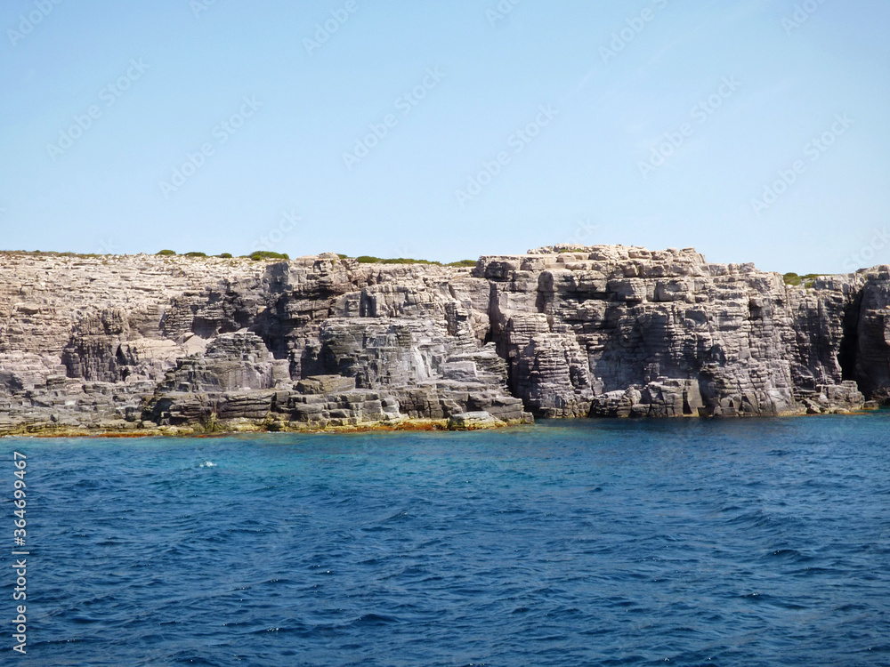Sardinia Along the cliffs of the island of San Pietro, cavities and sea caves
