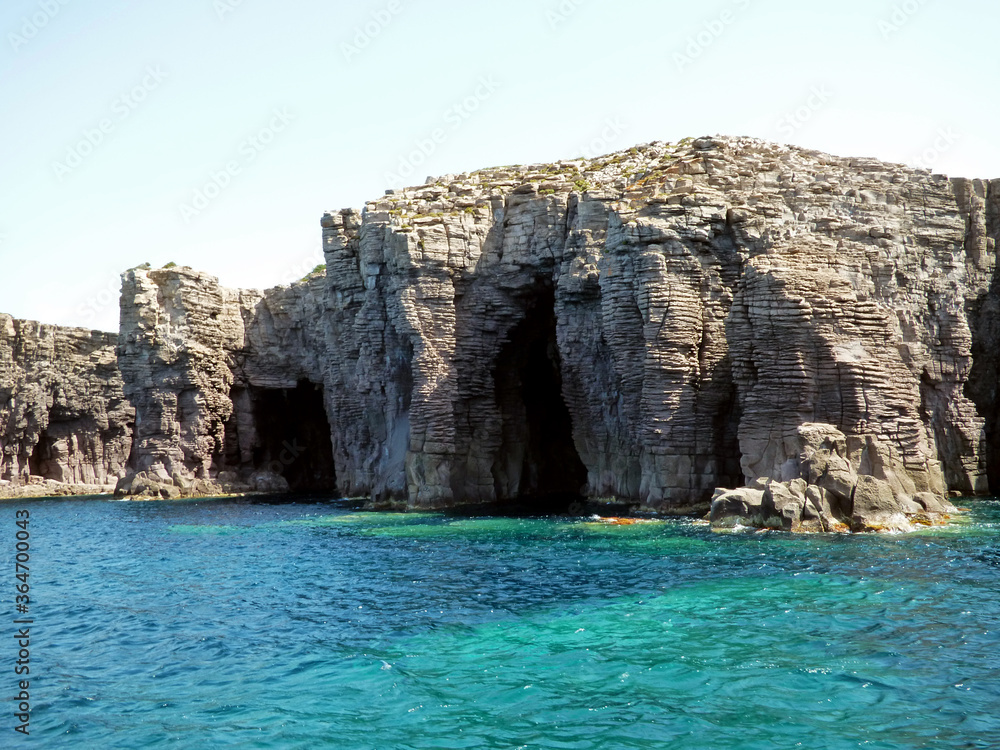 Sardinia Along the cliffs of the island of San Pietro, cavities and sea caves