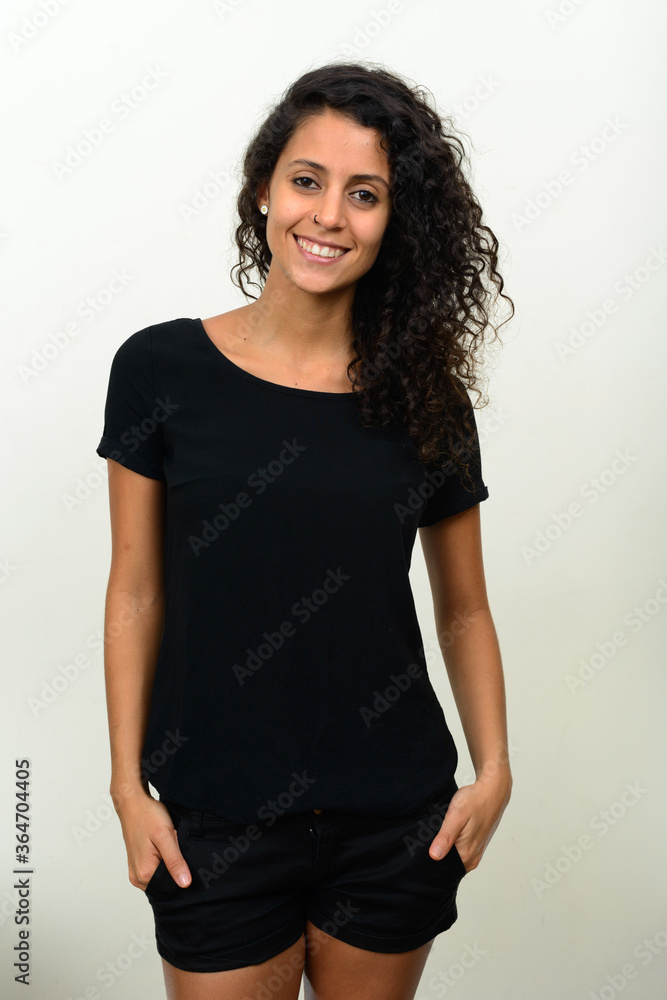 Portrait of happy young beautiful Hispanic woman Portrait of happy young beautiful Hispanic woman