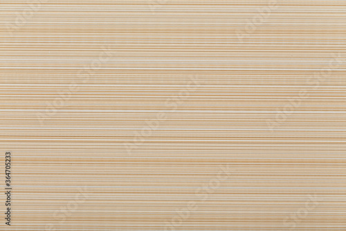 Base texture with embossed horizontal lines beige brown blue. Background design with space for text.