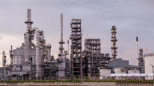 Timelapse of Aerial view footage of Oil refinery, Oil Industry at sunset.
