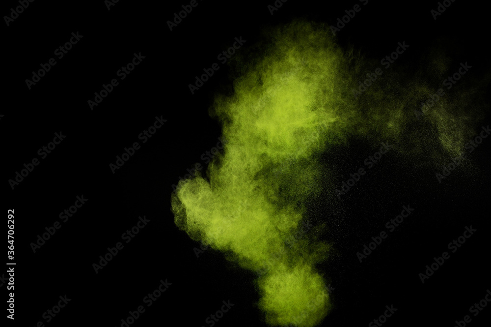 Light green powder explosion on black background. Colored powder cloud. Colorful dust explode. Paint Holi. Light green powder explosion on black background. Colored powder cloud. Colorful dust explode. Paint Holi.
