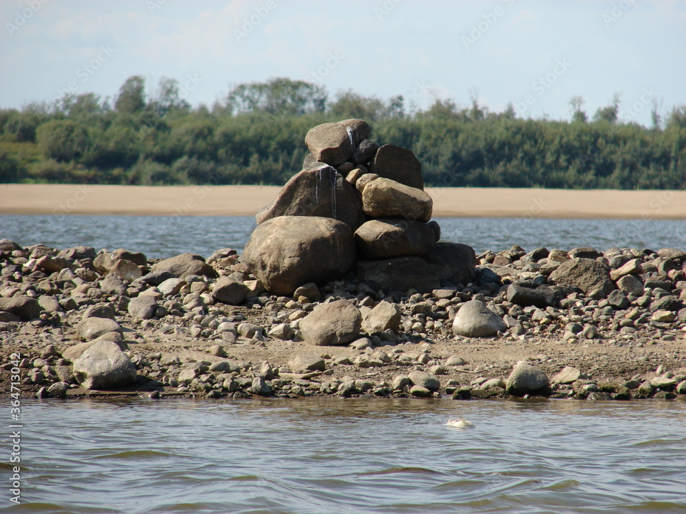 stone hill on the river