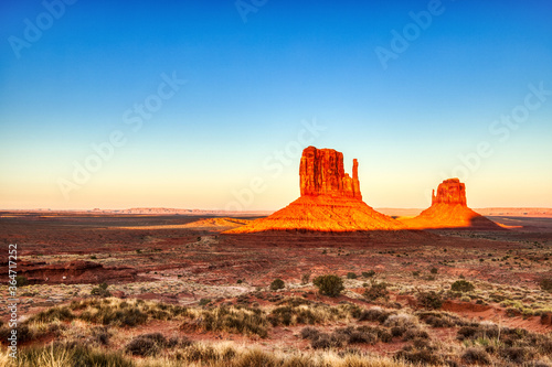 Monument Valley in Navajo National Park Illuminated by Sunset, Border of Utah and Arizona