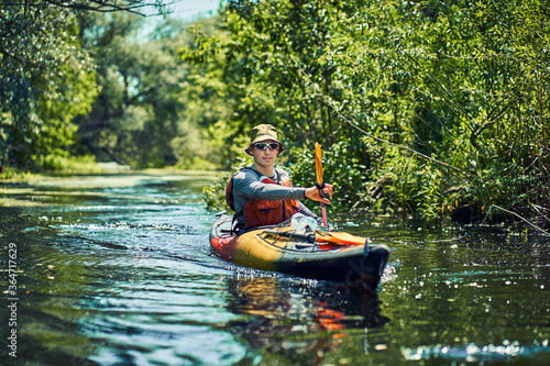 Happy best friends having fun on a kayaks. Kayaking on the river. © 6okean