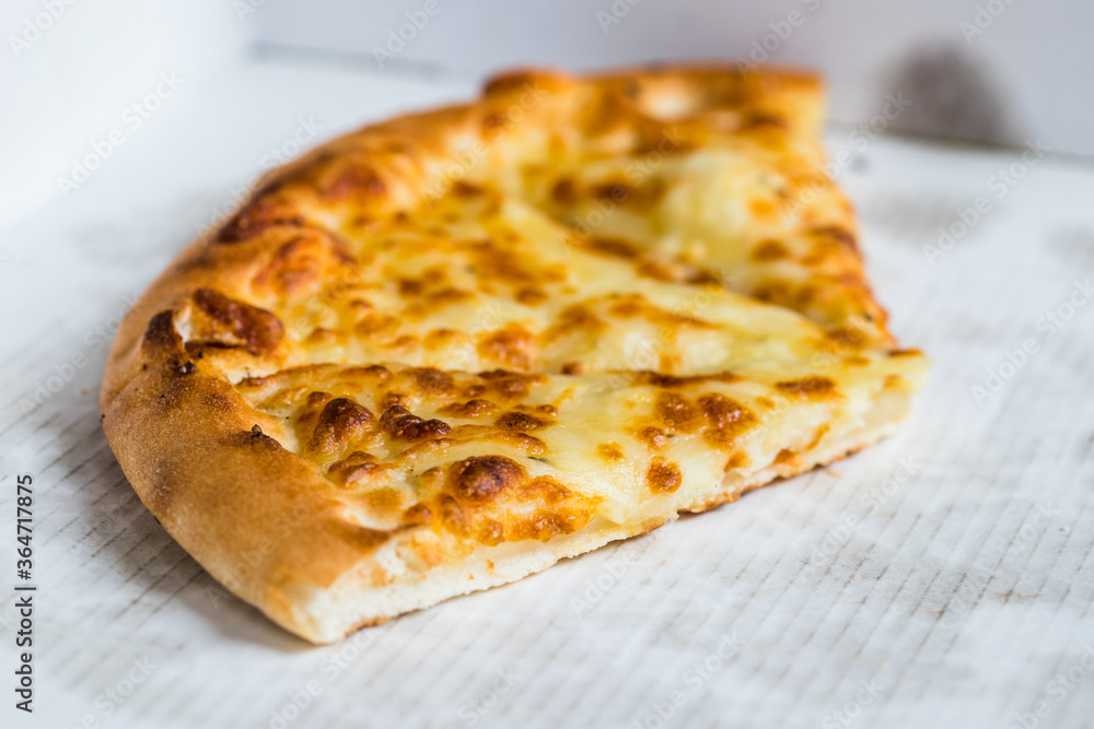 Cheesy garlic bread in a pizza box Cheesy garlic bread in a pizza box