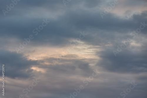 Fototapeta Naklejka Na Ścianę i Meble -  Cloudy sunset on a summer evening