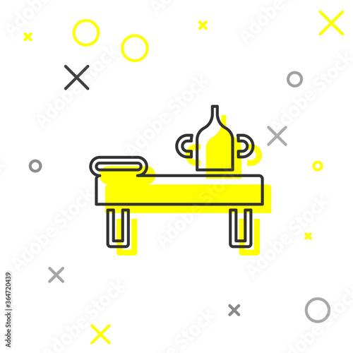 Grey line Massage table with oil icon isolated on white background. Vector.