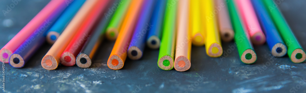Colour pencils on the dark natur background. Colour pencils on the dark natur background.