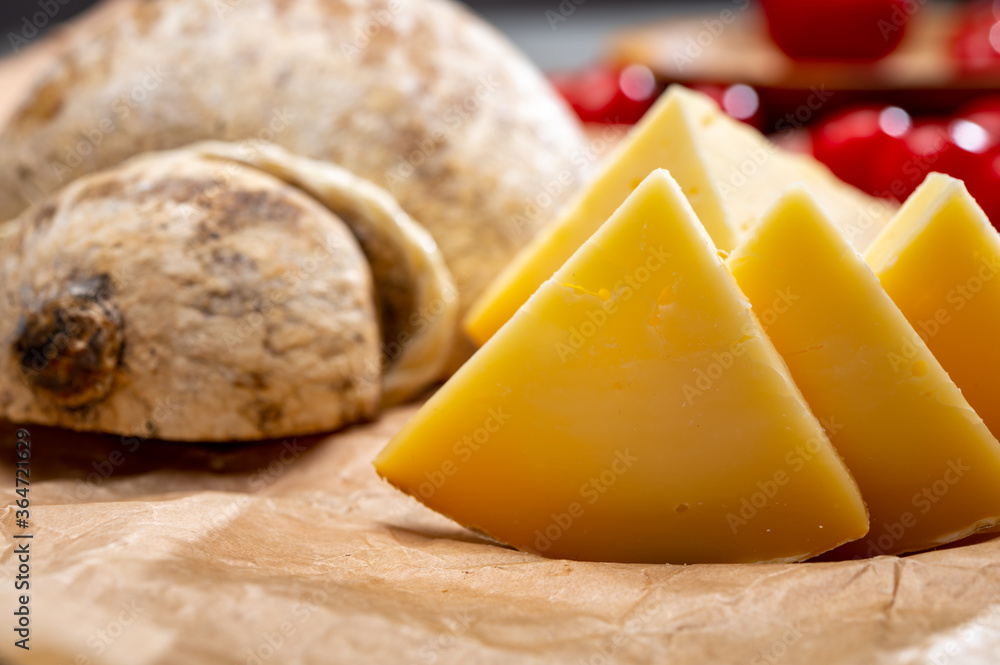 Italian semi hard matured caciocavallo cheese, handmade and aged in natural underground caves in Apulia region