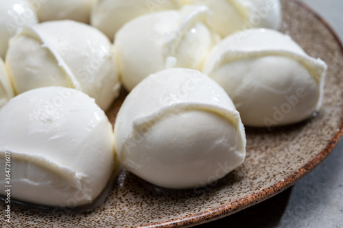 Tasty italian food, fresh white buffalo mozzarella soft cheese balls from Campania