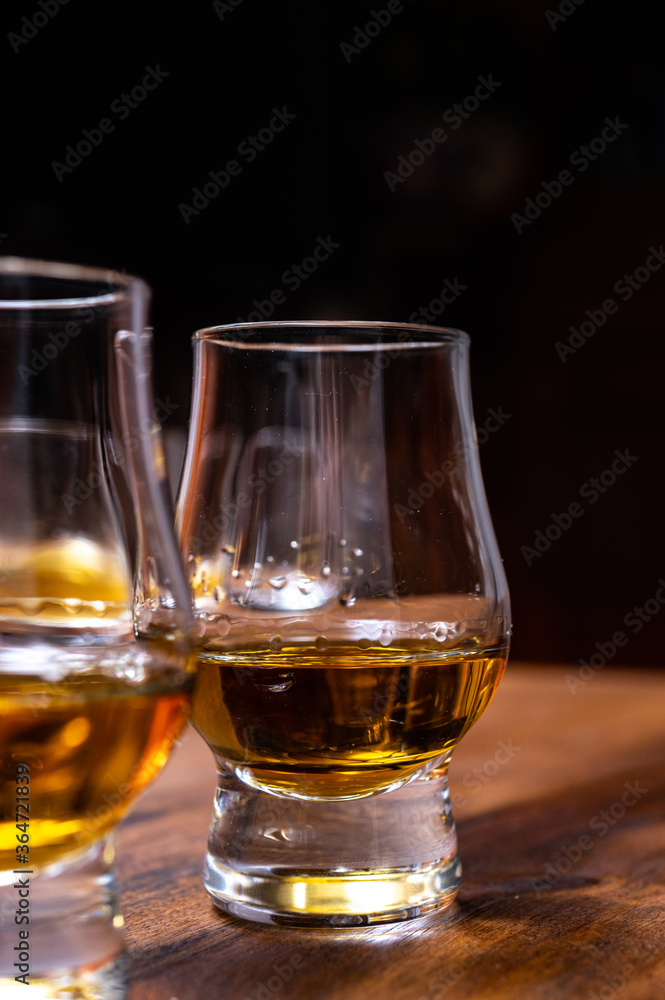 Scotch single malt or blended whisky tasting on distillery in Scotland, UK Scotch single malt or blended whisky tasting on distillery in Scotland, UK