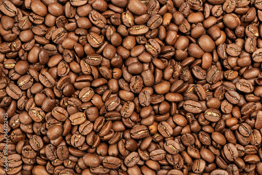 Background coffee beans. Pattern of brown roasted coffee bean beans