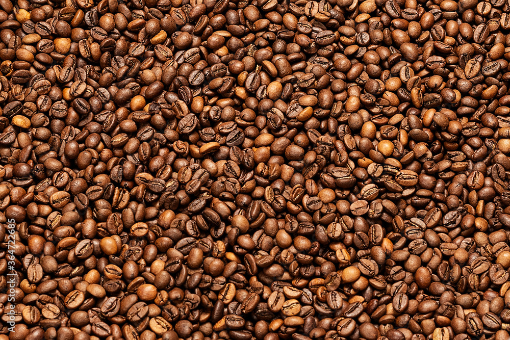 Background coffee beans. Pattern of brown roasted coffee bean beans Background coffee beans. Pattern of brown roasted coffee bean beans