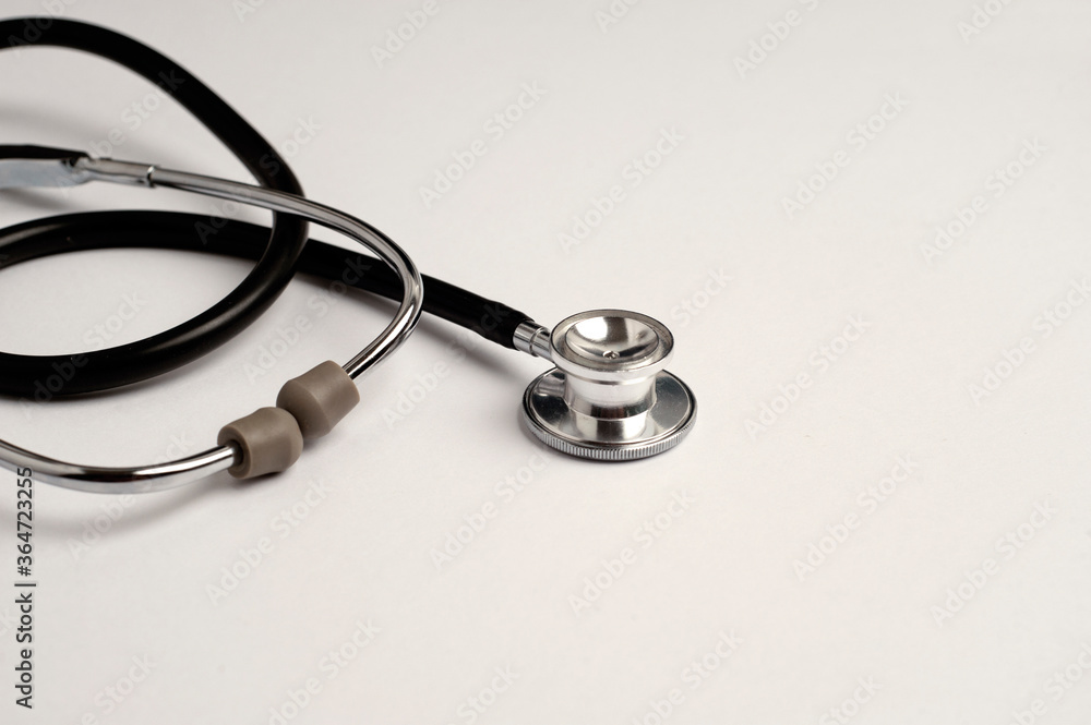 stethoscope partial view with white background, text space stethoscope partial view with white background, text space