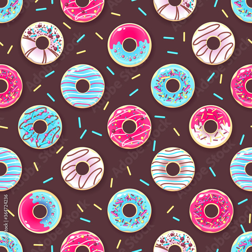 Seamless pattern of colorful sweet donuts. Junk food background photo