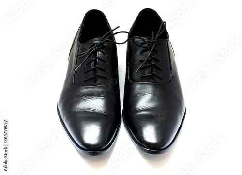 A pair of leather elegant shoes on a white background