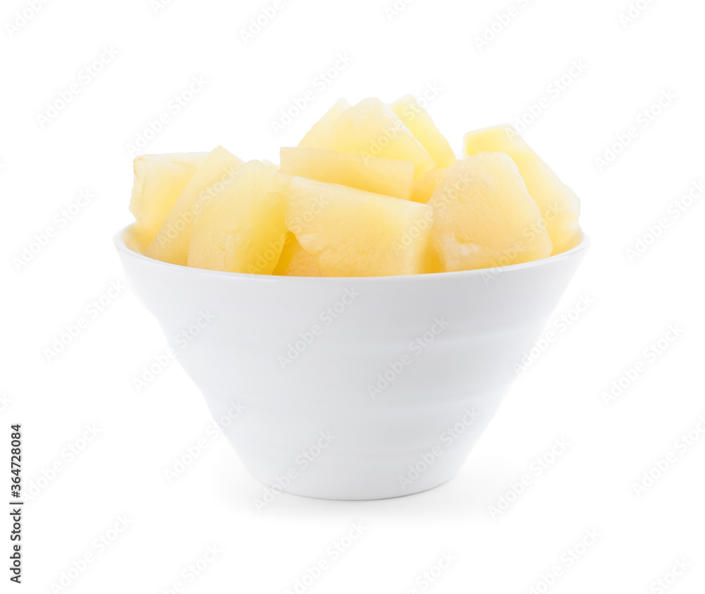 Pieces of delicious canned pineapple in bowl on white background Pieces of delicious canned pineapple in bowl on white background