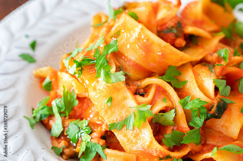 Delicious traditional italian pappardelle pasta with ragu.