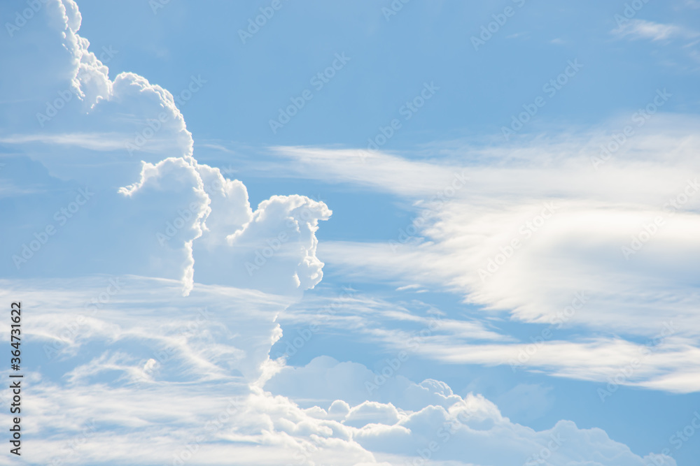 Fototapeta premium The beauty of the sky with clouds and the sun.