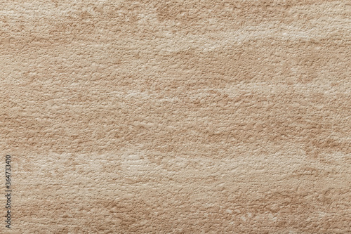 Travertine beige stone texture. Half sanded structured surface. Background design.
