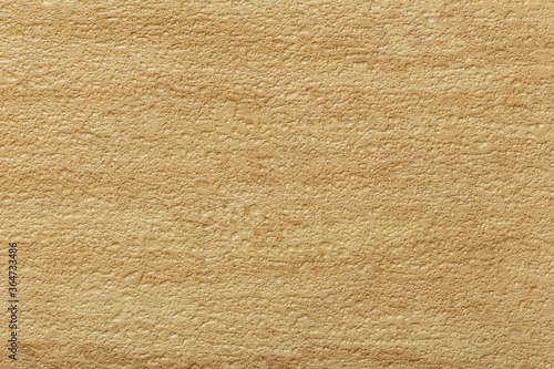 Travertine yellow stone texture. Half sanded structured surface. Background design.