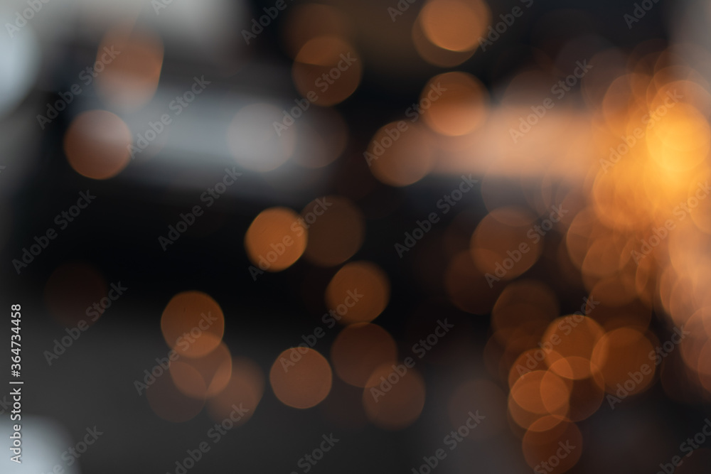 Fototapeta premium Gold abstract bokeh background, Festive xmas abstract background with bokeh defocused lights and stars